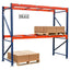 Heavy-duty pallet rack shelving with cardboard boxes on wooden pallets