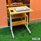 Portable wooden laptop table with wheels, two lower shelves, smartphone and laptop on top