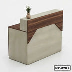 Modern wooden reception desk with two-tone finish and small potted plant on top