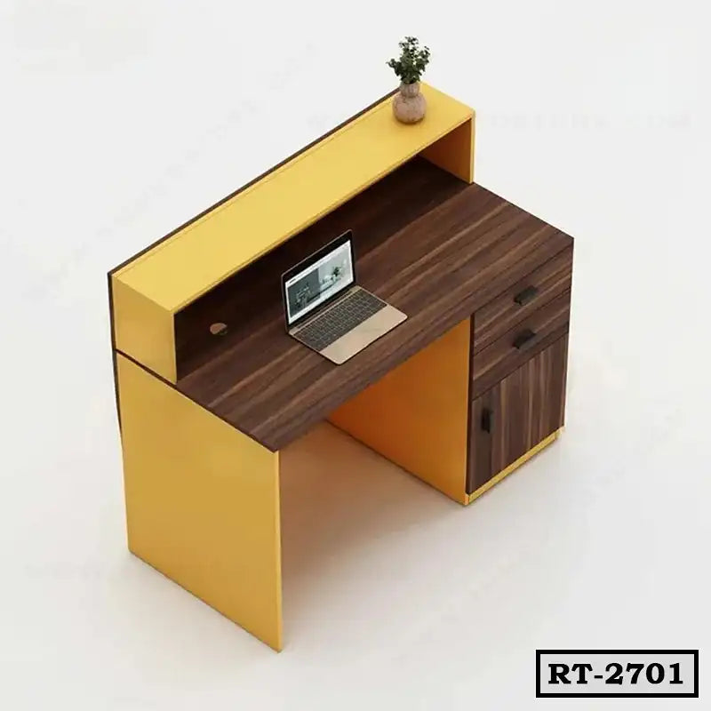 Modern yellow and brown reception desk with drawers, laptop, and small plant for office.