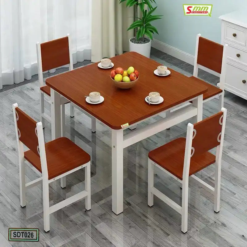 Modern square wooden dining table set with four chairs, fruit bowl and coffee cups