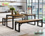 Modern dining table set with benches, black metal frame and wood top in a stylish kitchen