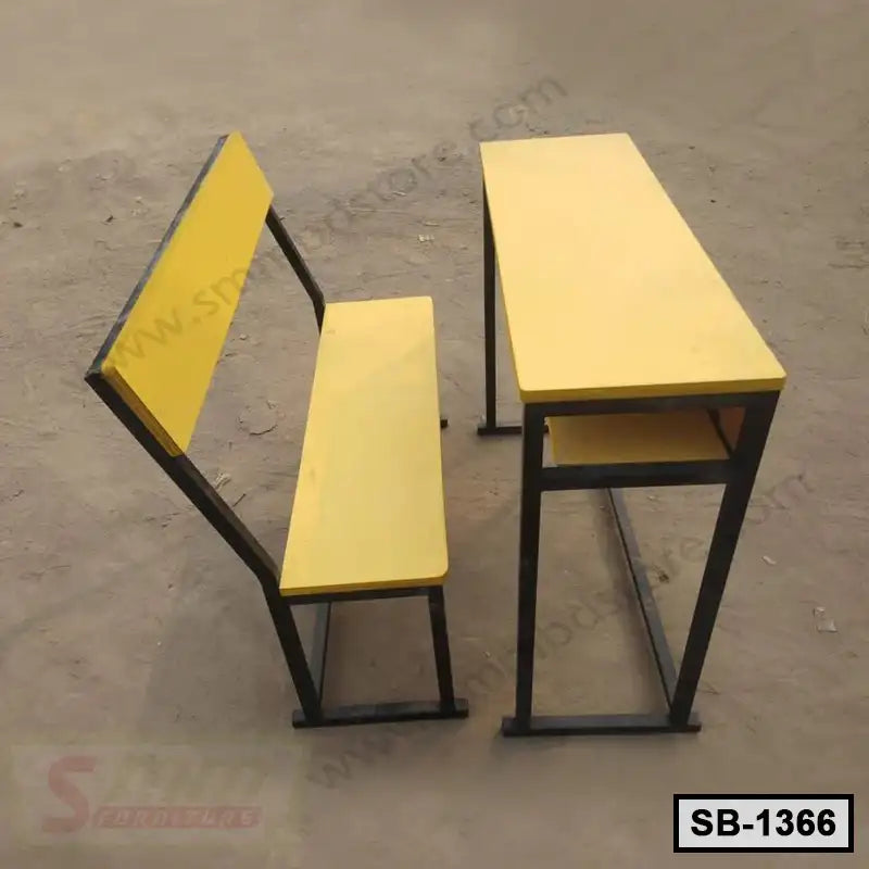 Yellow school bench and desk set with metal frame, outdoor setting, durable classroom furniture