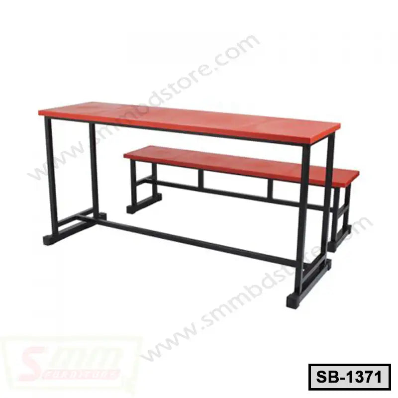 Modern school bench with red tabletop and seat, sturdy black metal frame, classroom furniture