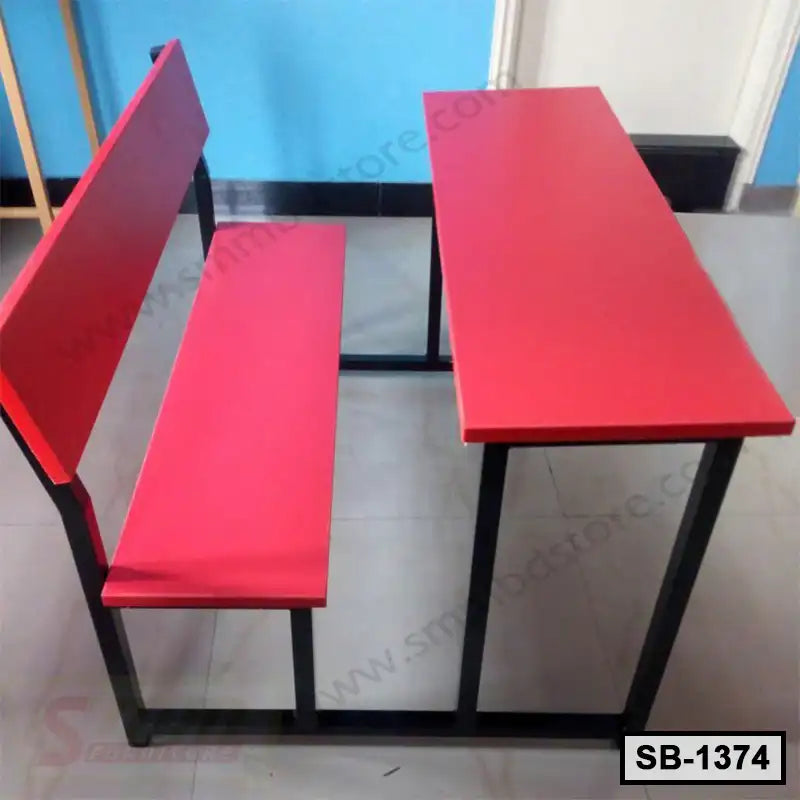 Red student bench with matching desk and metal frame, ideal for school classroom seating. Main image