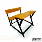 Wooden school bench with black metal frame and attached writing desk, student furniture