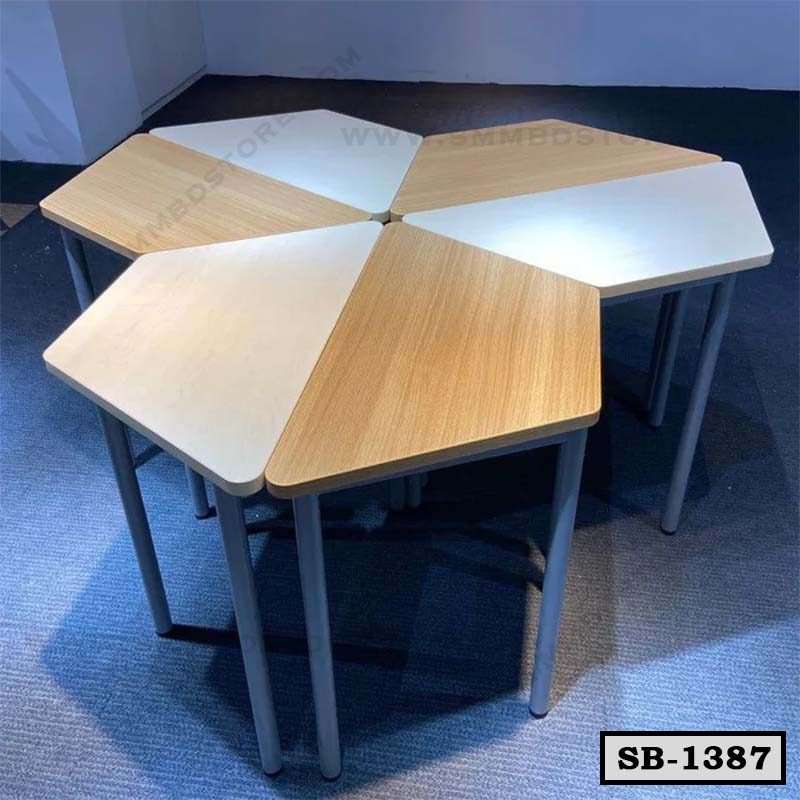 Set of four modular pentagon-shaped school desks with wood and white tops on metal legs
