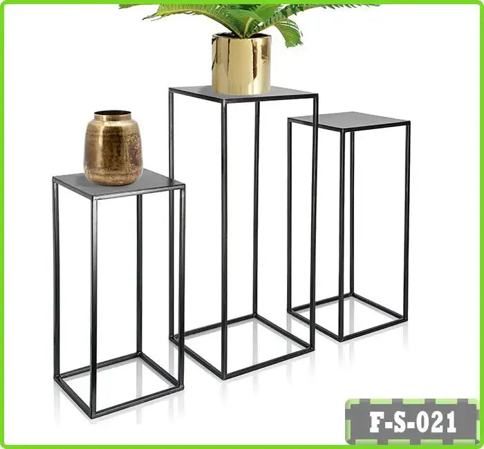 Set of three black metal nesting plant stands with square tops, displaying decorative vases Main image