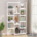 Modern white wooden bookshelf with decor, books, plants and storage boxes near window