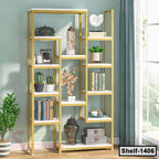 Modern gold metal bookshelf with white shelves, decorative plants, books, and accessories in a bright room