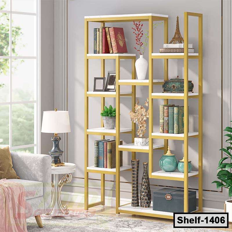 Modern gold metal and white bookshelf with decor and books in a bright living room