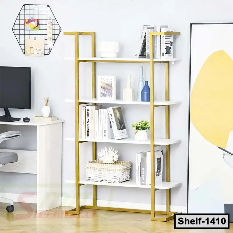 Modern gold and white bookshelf with books and decor, styled in a contemporary home office.
