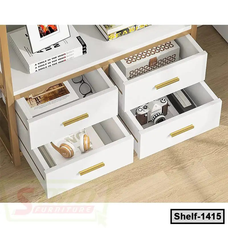 Modern white wooden shelf with six gold-handled drawers, books, camera, and headphones