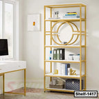 Modern gold and white office bookshelf with decorative geometric design, books, and desk nearby