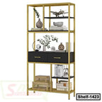 Modern gold and black metal bookshelf with decorative shelves and storage drawers