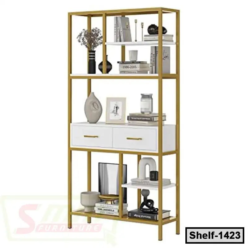 Modern gold and white metal bookshelf with drawers and decorative items, ideal for home or office