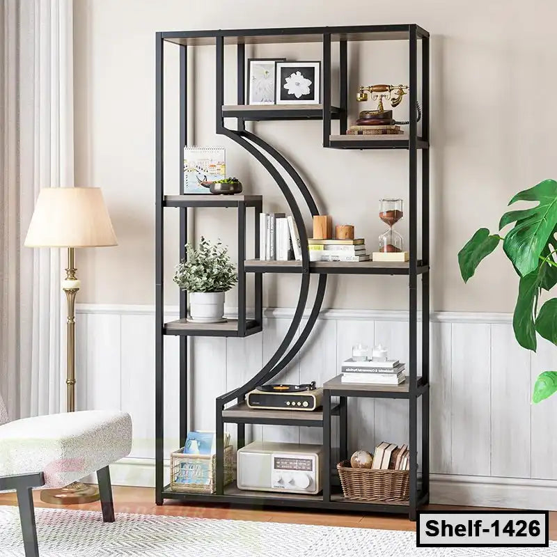 Modern black metal bookshelf with decorative items, books, and plants in a stylish living room