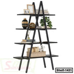 Modern black ladder bookshelf with four tiers, decorated with books, vases, and a plant.