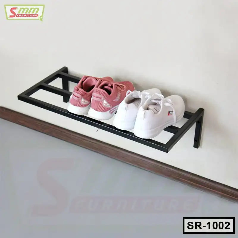 Wall-mounted metal shoe rack with pink and white sneakers, modern home organization