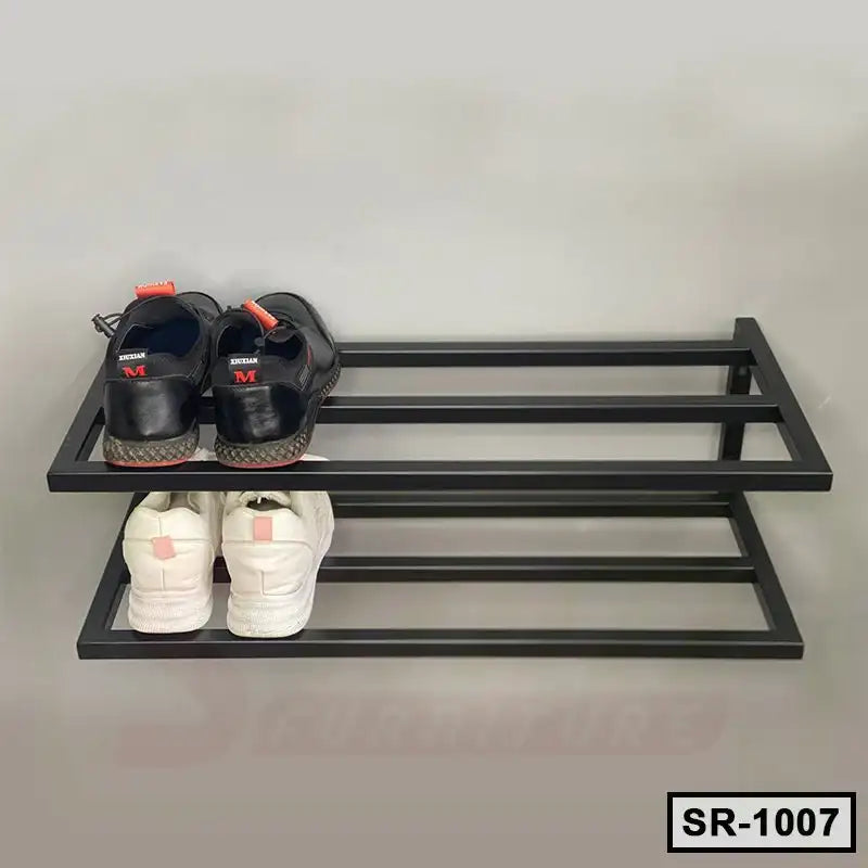 Two-tier black metal shoe rack with sneakers and loafers on a light background Main image