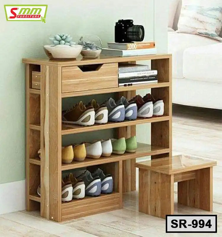 Wooden shoe rack with three shelves, storage drawer, and small side stool in modern living room. Main image