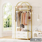 Modern standing closet organizer with hanging rack, storage shelves, and two drawers in a bright bedroom.