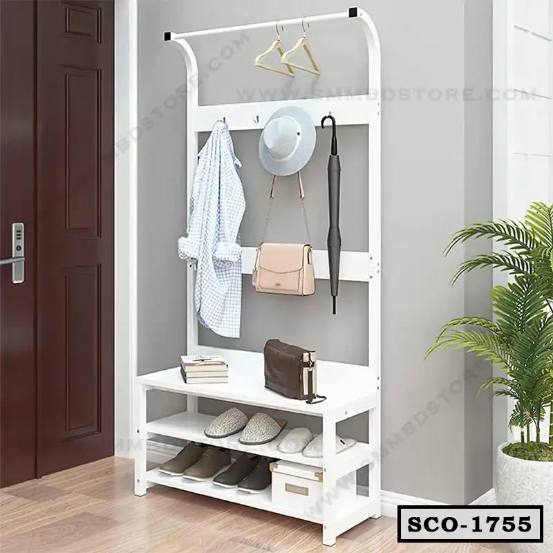 White standing closet organizer with hooks, shelves, shoe storage, and coat rack in entryway
