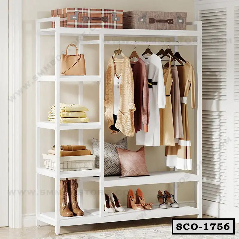 Standing closet organizer with shelves and hanging rod, displaying clothes, shoes, and storage boxes