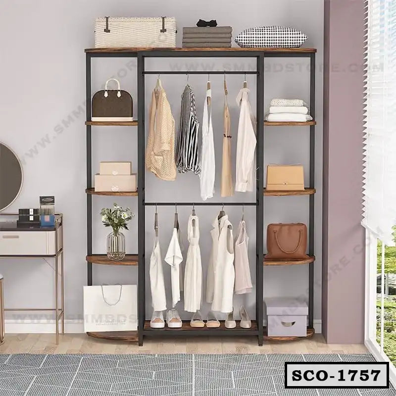 Modern standing closet organizer with shelves, hanging clothes, bags, and storage boxes