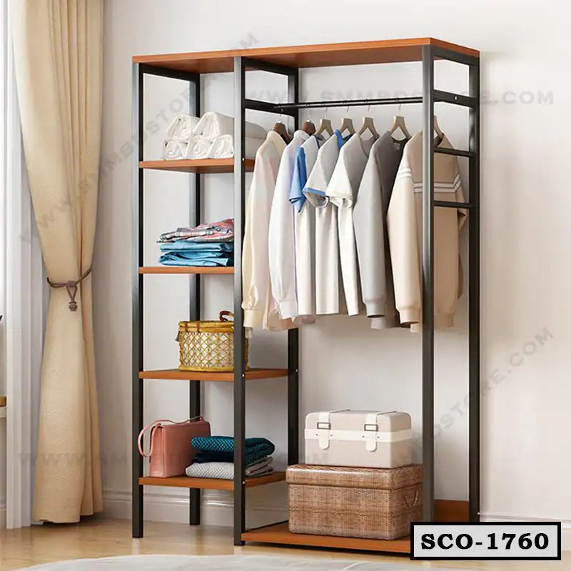 Standing closet organizer with metal frame, wooden shelves, hanging rod, and storage boxes