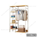 Standing closet organizer with shelves and hanging clothes, modern wardrobe storage unit