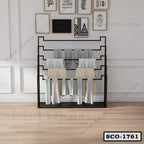 Modern standing closet organizer with towels in a minimalist home interior