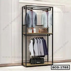 Standing closet organizer with metal frame, hanging clothes, shelves, and storage bag