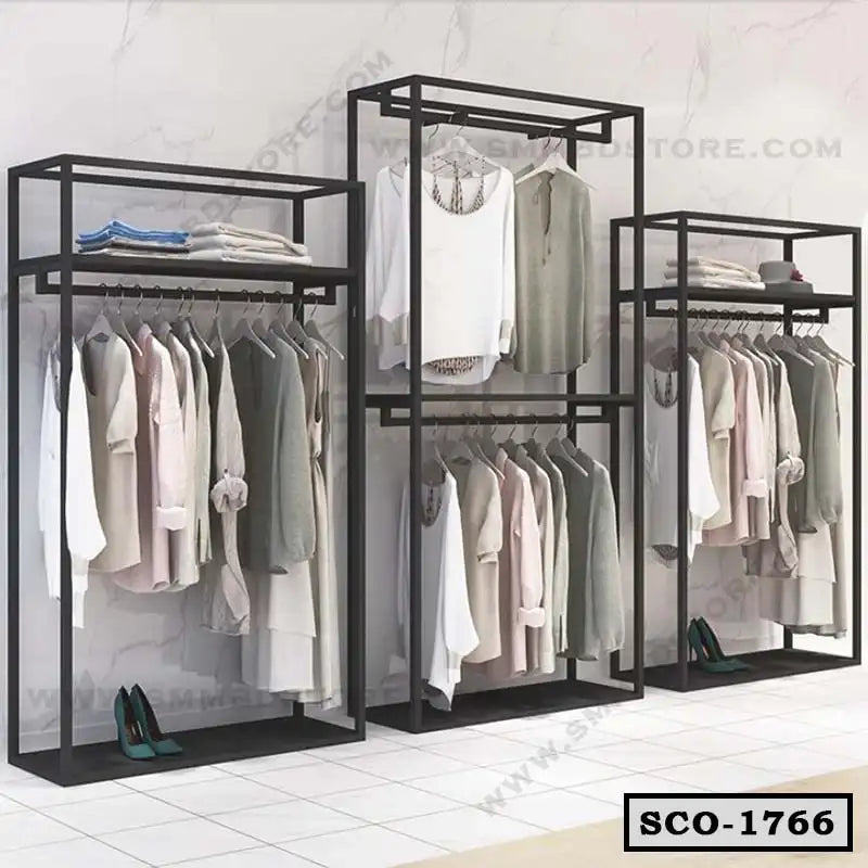 Modern standing closet organizer with black metal frame, open shelves, and hanging clothes. Main image
