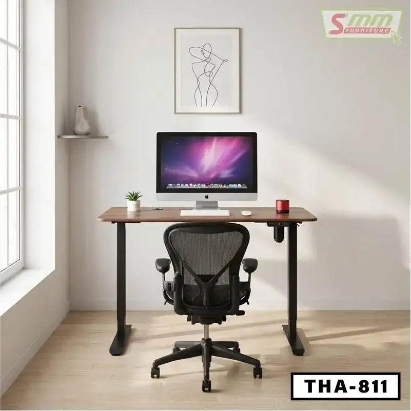 Modern standing desk with computer, ergonomic chair, and minimalist office decor
