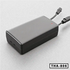 Black power adapter with dual cables for standing desk on light gray surface, THA-806 label