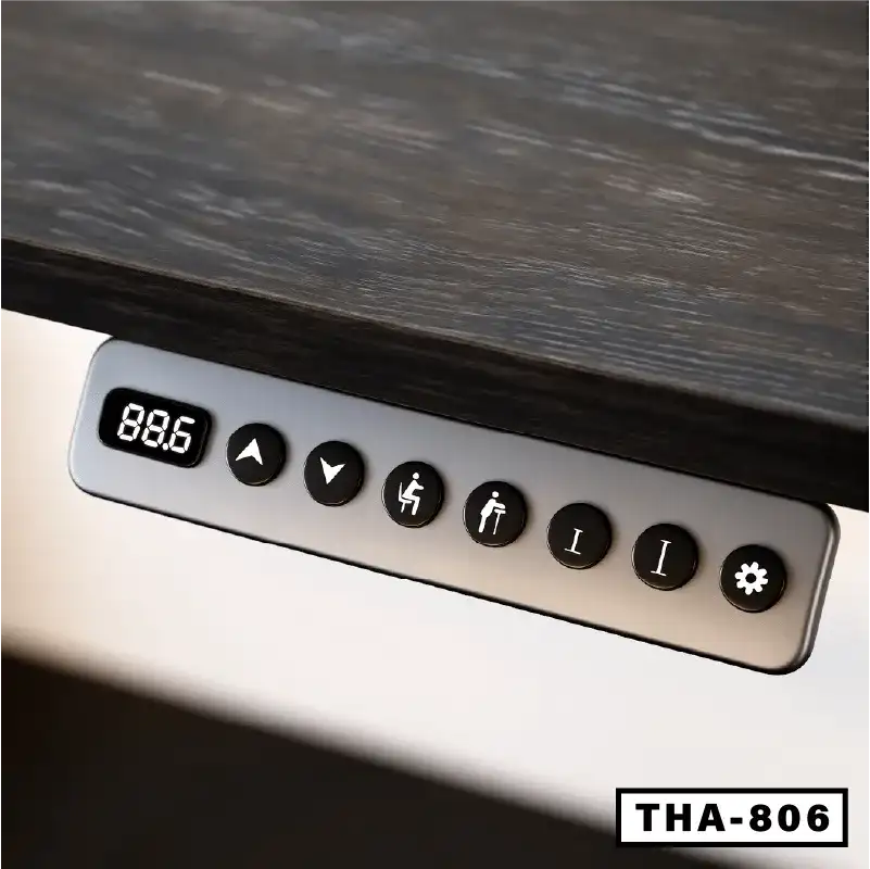 Close-up of standing computer desk control panel with digital height display and adjustment buttons