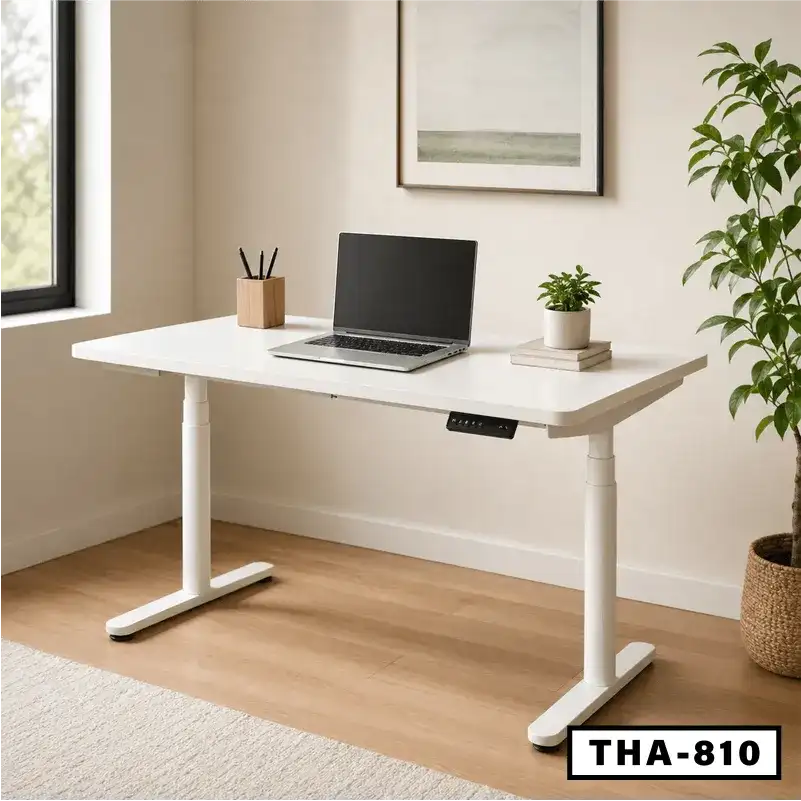 Modern white standing computer desk with laptop, plant, and stationery in home office Main image