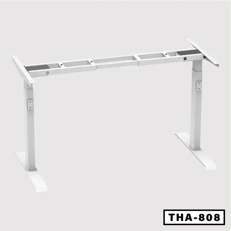 White standing desk frame with double motors and adjustable legs on a plain background