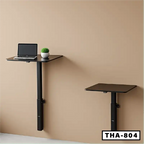 Adjustable wall-mounted laptop tables with black surface in modern office setting