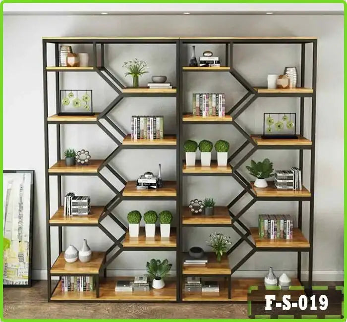 Modern steel and wood bookshelf with geometric frame, displaying books, plants, and decor.