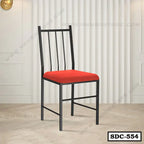 Modern steel dining chair with red cushioned seat, black metal frame, model SDC-554