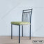 Modern steel dining chair with green cushioned seat and black metal frame, model SDC-555