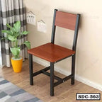 Modern steel dining chair with wooden seat and backrest in a cozy home setting