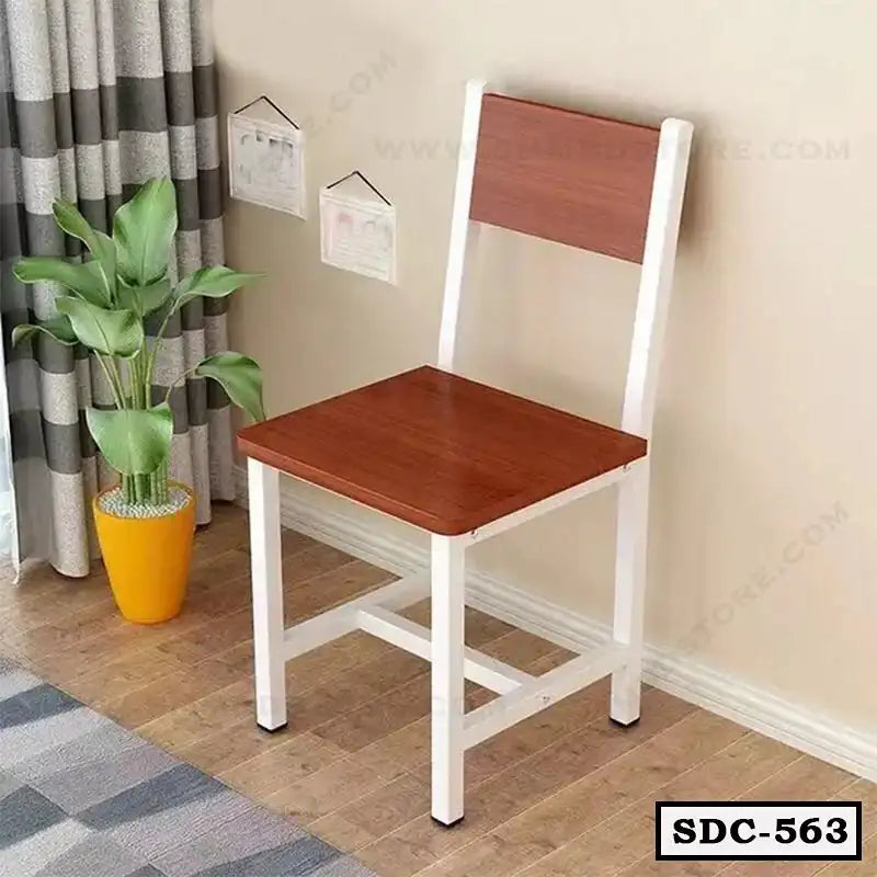 Modern steel dining chair with wooden seat and backrest in a home interior
