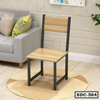 Modern steel dining chair with wooden seat and backrest, placed in a living room setting