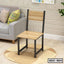 Modern steel dining chair with wooden seat and backrest, placed in a living room setting