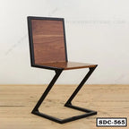 Modern steel dining chair with wooden seat and backrest, minimalist Z-shape design