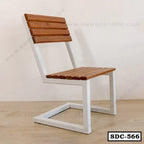 Modern steel dining chair with wooden slats and white metal frame on wooden floor