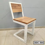 Modern steel dining chair with white frame and wood seat, ideal for home or office